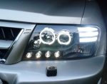 Φανάρια εμπρός για Mitsubishi Pajero (2001-2006) - μαύρα , με λάμπες (Η1) - σετ 2τμχ. - Image 10