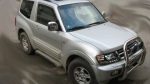 Φανάρια εμπρός για Mitsubishi Pajero (2001-2006) - μαύρα , με λάμπες (Η1) - σετ 2τμχ. - Image 9